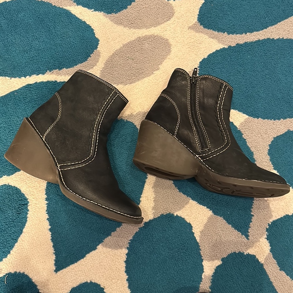 Black leather Fly London booties